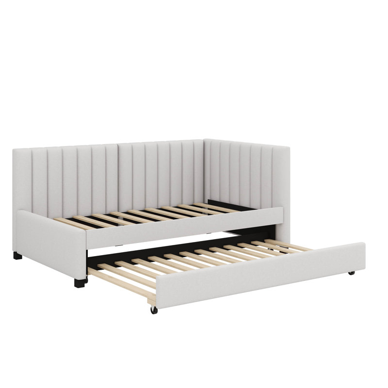 A Upholstered Daybed That Comes With A Built-In Twin-Sized Pull-Out Sofa Bed Frame, Beige