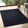 Esterly Shaggy Black Area Rug