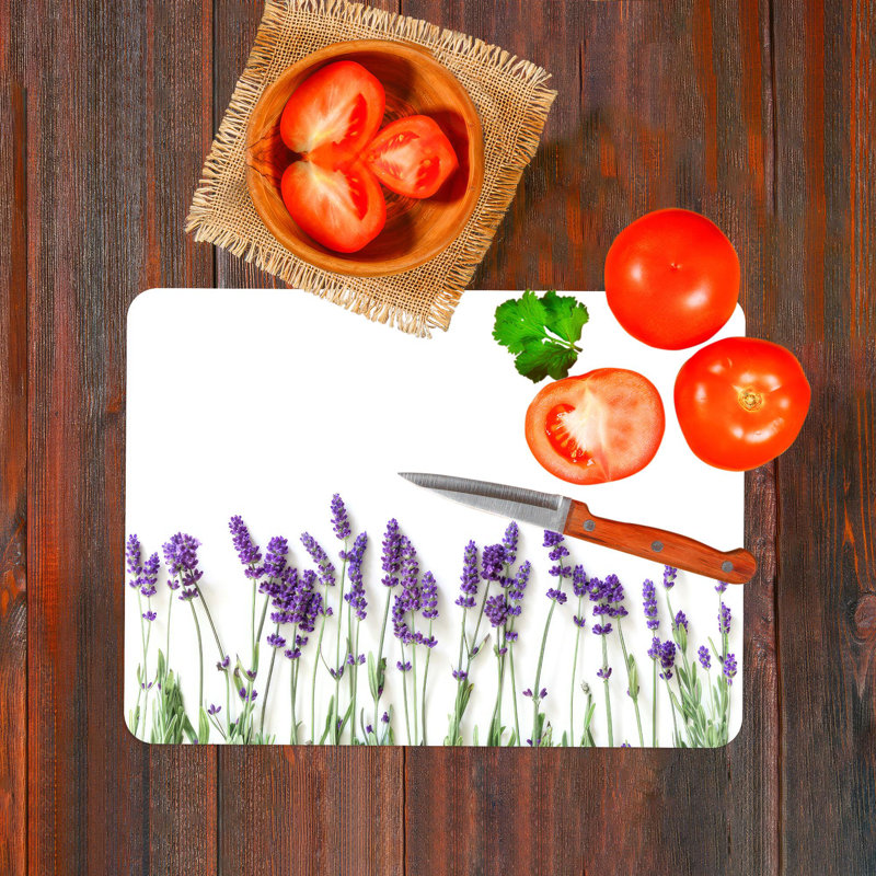 Planche à découper en verre trempé de couleur lavande à motif botanique mauve avec des accents floraux, idéale pour le service et la décoration de cuisine