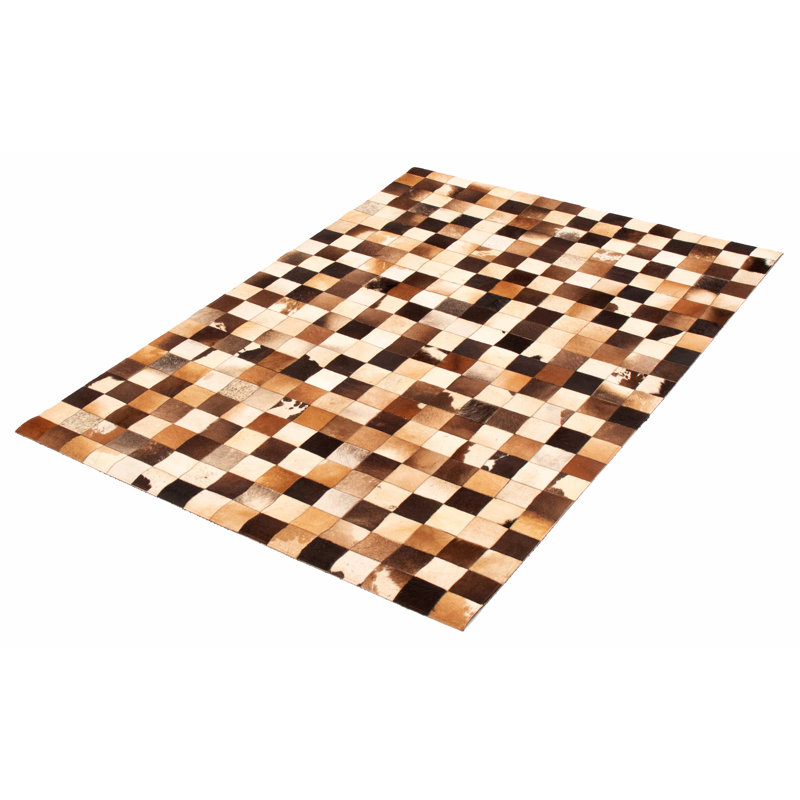 Tapis brun foncé en cuir de vache fabriqué à la main Lasater