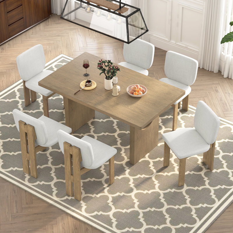 Ensemble de salle à manger 7 pièces avec table à tréteaux Kamanda et 6 chaises rembourrées Kamanda, Beige