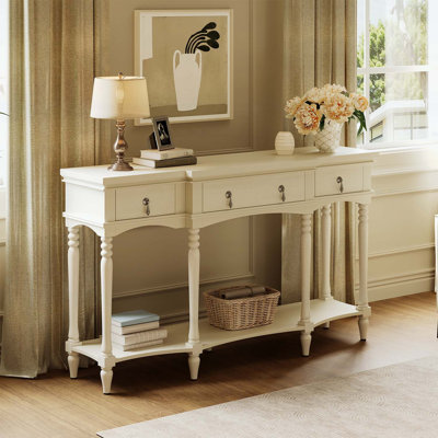 Console rétro avec structure en bois, pieds romains tournés