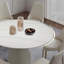 Table de salle à manger moderne en pierre frittée moderne avec base en acier inoxydable et 4 chaises