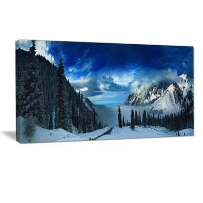 Panorama des montagnes enneigées - reproduction de photo sur toile tendue