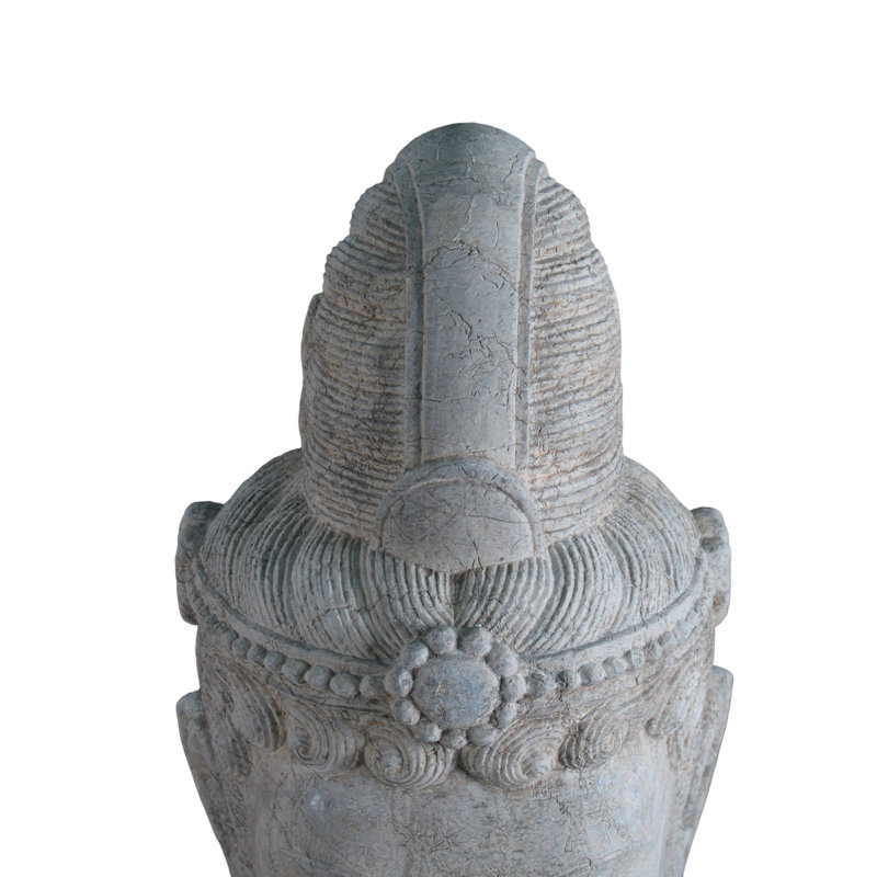A Stone Statue Of Guanyin Head
