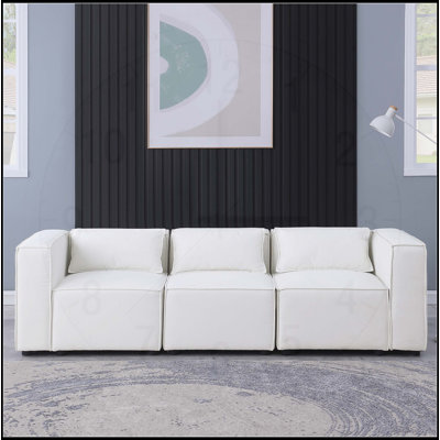 Canapé modulaire polyvalent à assise et dossier moelleux