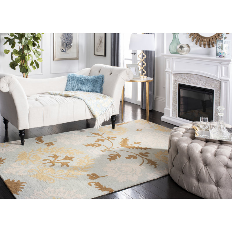 Jahiem Floral Handmade Looped Wool Blue Area Rug, Rectangle 5' x 8'