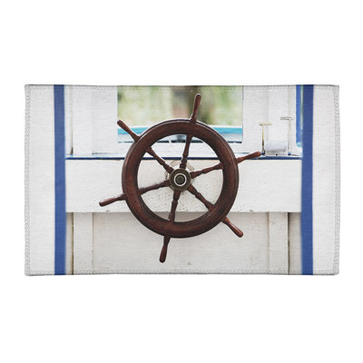 Tapis blanc cassé roue de bateau