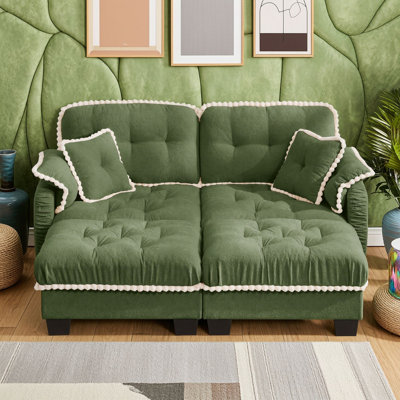 Causeuse avec repose-pieds mobile et quatre coussins