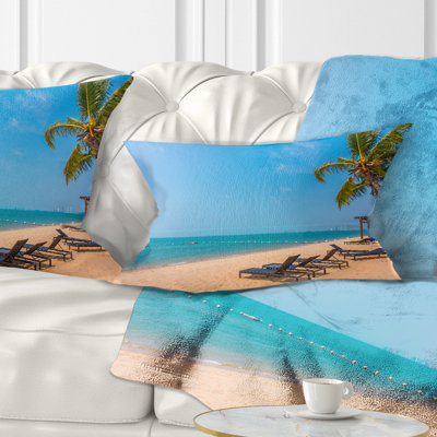 Coussin imprimé plage bleue avec palmiers