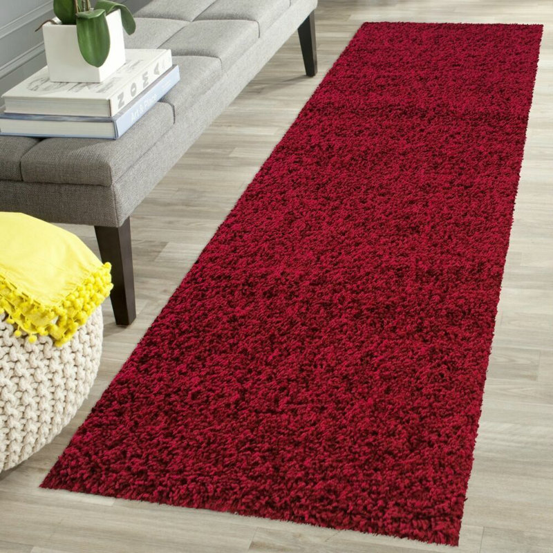 Aanuoluwa Solid Colour Shag 60cm X 110cm Area Rug