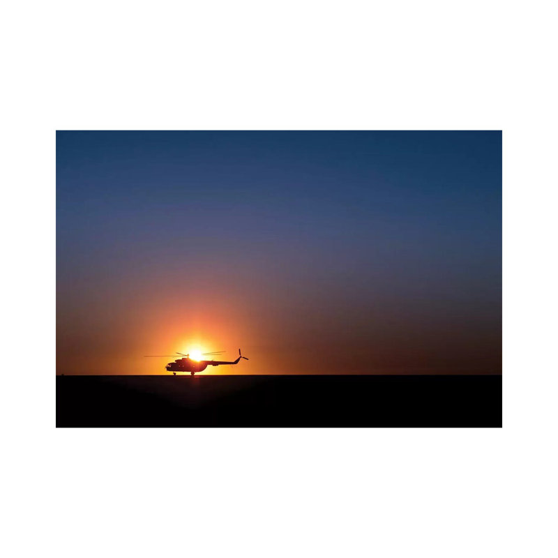 A Sikorsky S-61L Mk II Helicopter Taxis On The Runway During Sunrise by Stocktrek Images - Wrapped Canvas Print