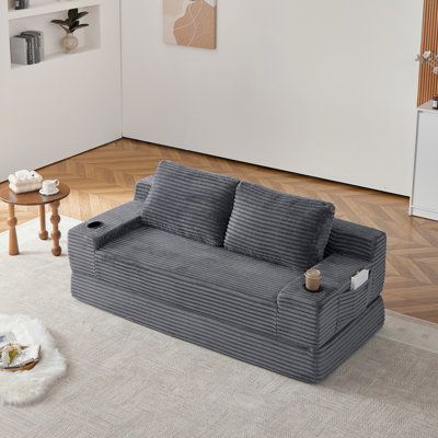 70.8-inch corduroy two-in-one sofa bed, featuring a lounge chair with two throw pillows, built-in cup holders in the armrests, and side storage pockets-ideal for living rooms, bedrooms, and relaxation