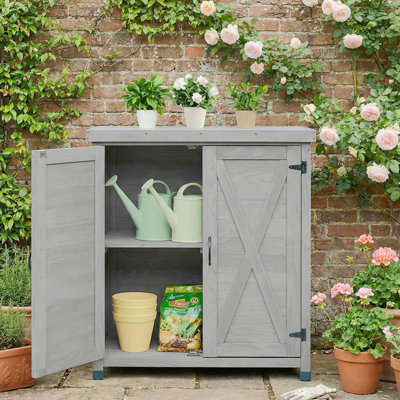 Banc de rempotage d'extérieur résistant aux intempéries avec rangement, banc de travail pour station de travail avec plateau en métal, table de jardinage extérieur avec armoire, portes de grange en X Design, gris