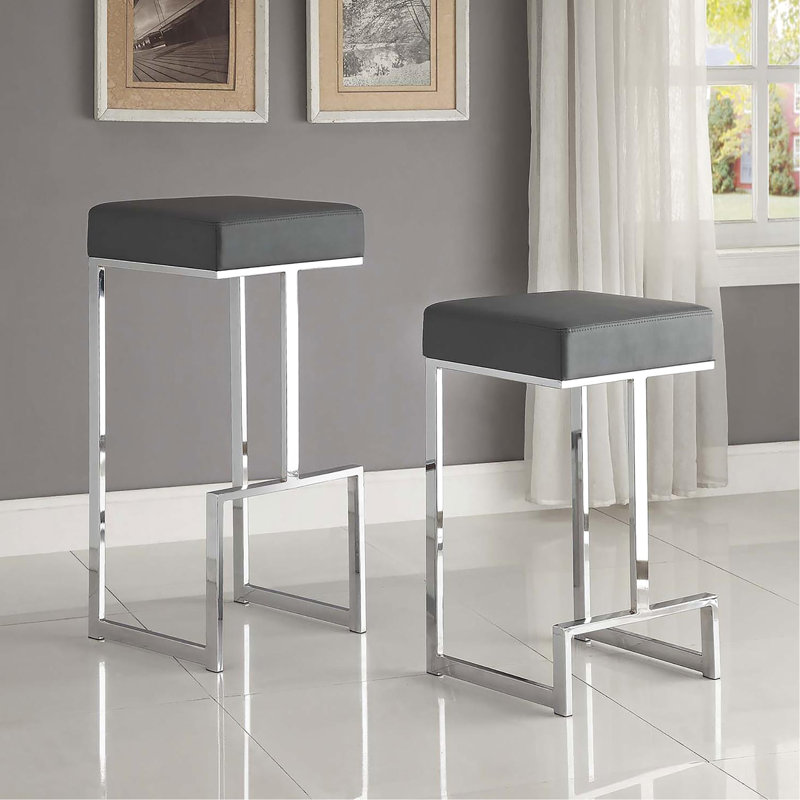 Tabouret gris rembourré pour les espaces de vie modernes