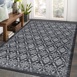 https://assets.wfcdn.com/im/15445699/resize-h310-w310%5Ecompr-r85/2627/262725990/machine-braided-polyester-machine-washable-rug.jpg