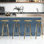 Ensemble de 4 tabourets de bar pivotants réglables, tabourets de comptoir industriels en métal avec repose-pieds, chaises de bar pour îlot de cuisine, bar personnel, pub