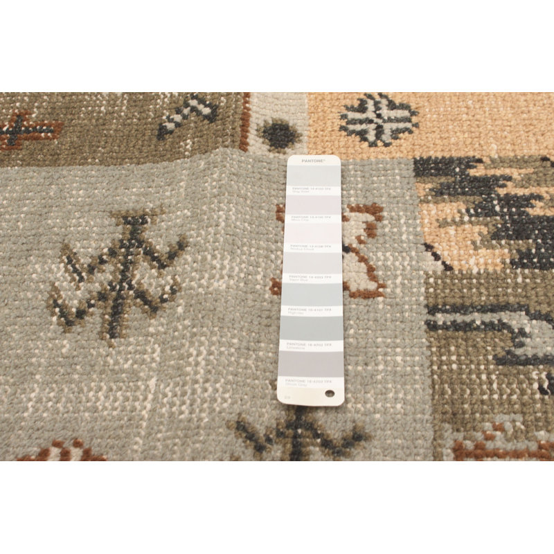 Tapis gris en laine noué à la main