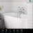 Mosson Antique Brass Wall-Mounted Tub Faucet with Hand Shower and Traditional Cross-Handle Styling