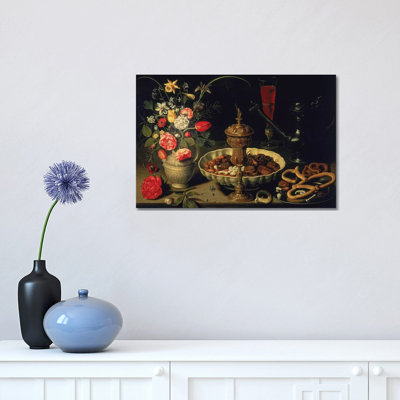 Still Life Of Flowers And Dried Fruit by Clara Peeters - Wrapped Canvas Print