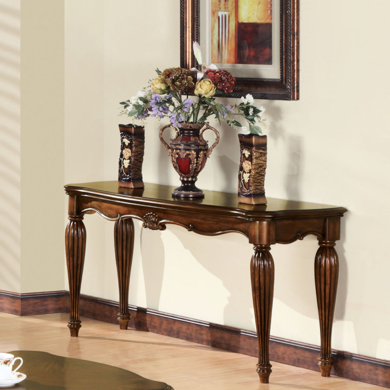 Table en cerisier de style traditionnel avec un grand espace de présentation et des pieds élégants et classiques