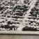 Riebe Black Area Rug