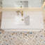 Meuble-lavabo suspendu de 122 cm (L) x 53 cm (P) avec comptoir en pierre, éclairage DEL intégré, design cannelé à deux niveaux, tiroirs à fermeture amortie, blanc