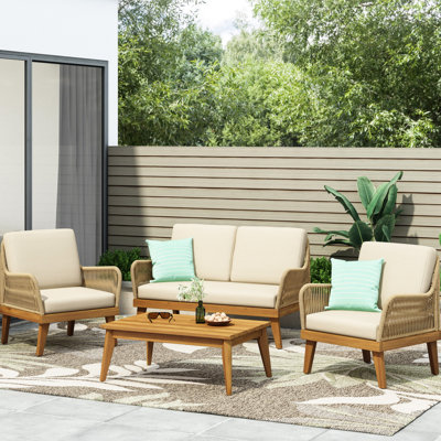 Chat en bois avec beau tissage en corde, coussins d'eau, 2 fauteuils club et table basse
