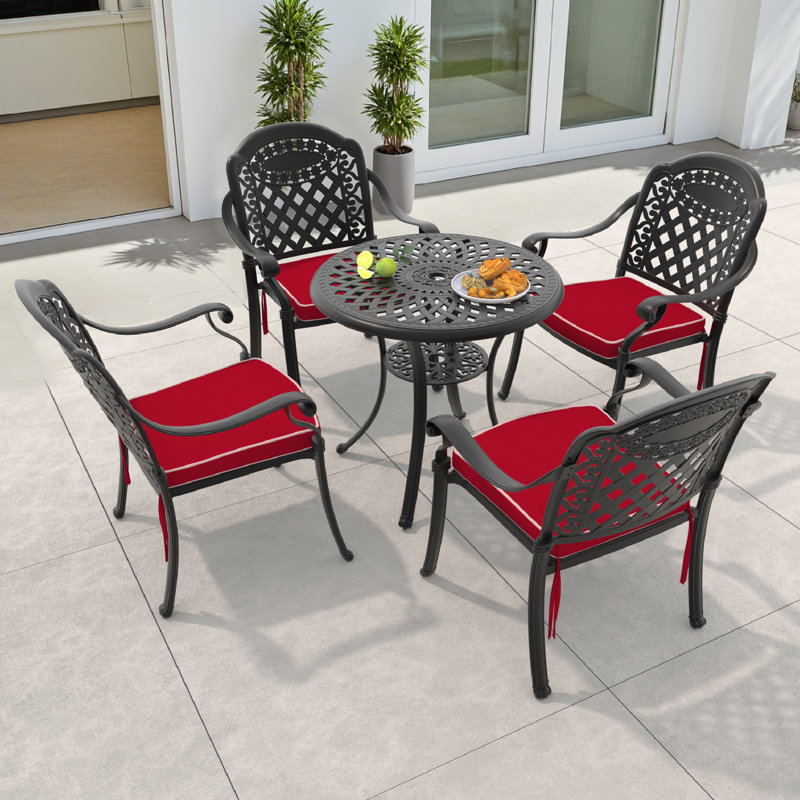 Ensemble de salle à manger rond pour patio 4 personnes 30,71 po avec trou pour parasol, 4 chaises empilables avec coussins rouges