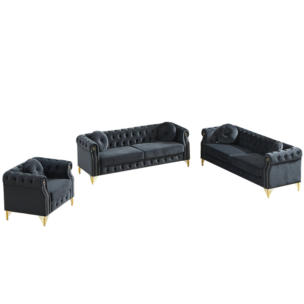 Everly Quinn Velvet Chesterfield sofa with two round pillows, featuring ...