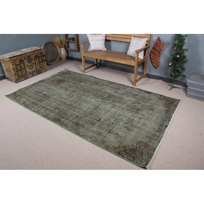 Chic tapis turc rétro vert pour rehausser l'esthétique de votre salon