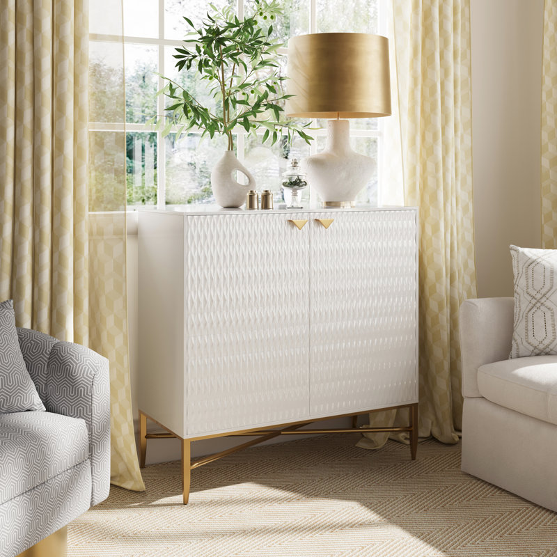 Armoire d'appoint moderne blanche à 2 portes avec pieds fuselés en métal, finition lisse et sens contemporain, pieds en X en laiton, support stable, installation facile, idéale pour la décoration du salon