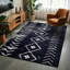 Tapis noir Thambiah-354534932