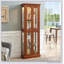 Vitrine éclairée avec étagères réglables et panneau arrière miroir pour des solutions de rangement élégantes à la maison