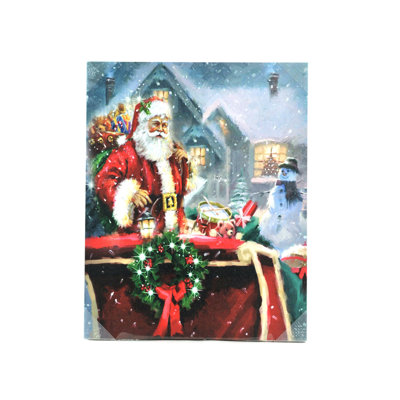 Impression sur toile de père Noël avec sac cadeau