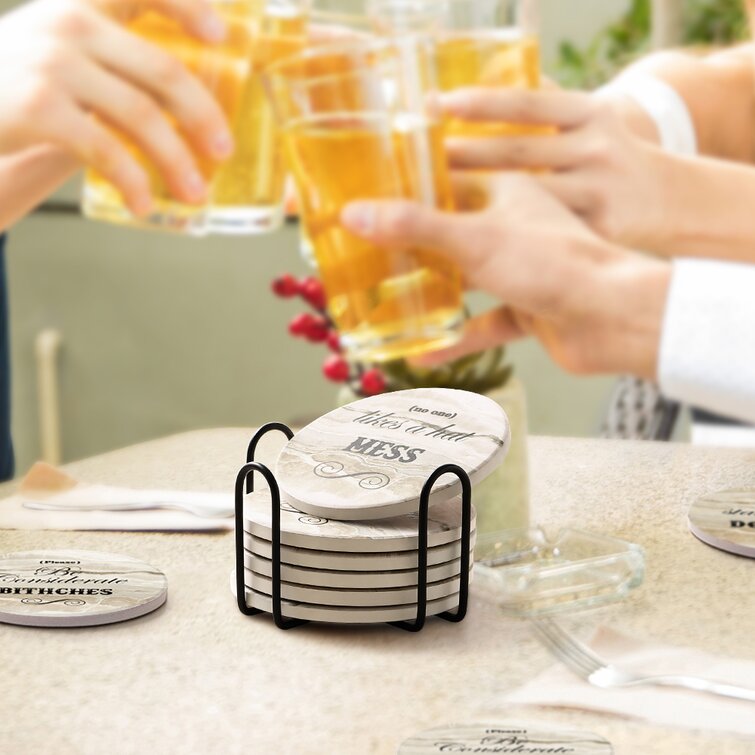 https://assets.wfcdn.com/im/15520290/resize-h755-w755%5Ecompr-r85/1255/125548262/Round+6+-Piece+Coaster+Set+With+Holder.jpg