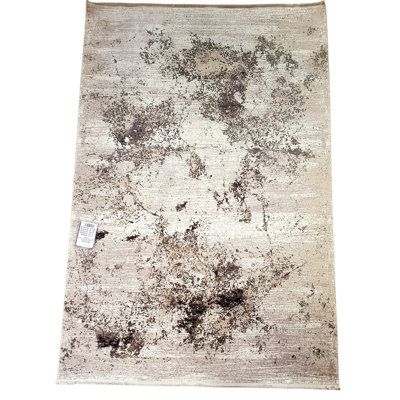 Tapis gris en fibres naturelles tissé à la machine