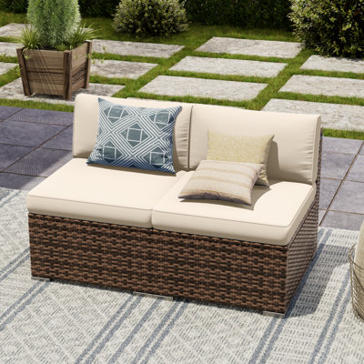 2 Piece Rattan Sectional Seating Group With Cushions