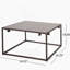 Table basse moderne et industrielle, gris et bronze