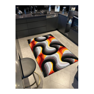 Tapis orange lavable à motif orange
