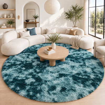 Tapis à poil long bleu doux à poils noués et teinté Ebern Designs