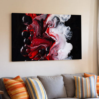 Toile, une composition abstraite dynamique avec des formes tourbillonnantes d'art cramoisi profond, rouge et blanc éclatant, créant un art mural sur toile