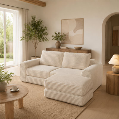Canapé-lit 2 en 1 pliable en velours côtelé - Un canapé décontracté à deux places à usage domestique avec un dossier légèrement inclinable, des lignes épurées et des coussins décoratifs inclus.