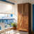 Farmhouse Pantry Cabinet with Adjustable Shelves and Barn Doors for Flexible Kitchen Storage Solutions.