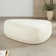 Adna 44'' Triangular Upholstered Ottoman