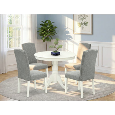 L'ensemble de mobilier de salle à manger 5 pièces comprend une table de cuisine ronde avec piédestal et 4 chaises de salle à manger Parsons en tissu Shitake foncé, lin blanc