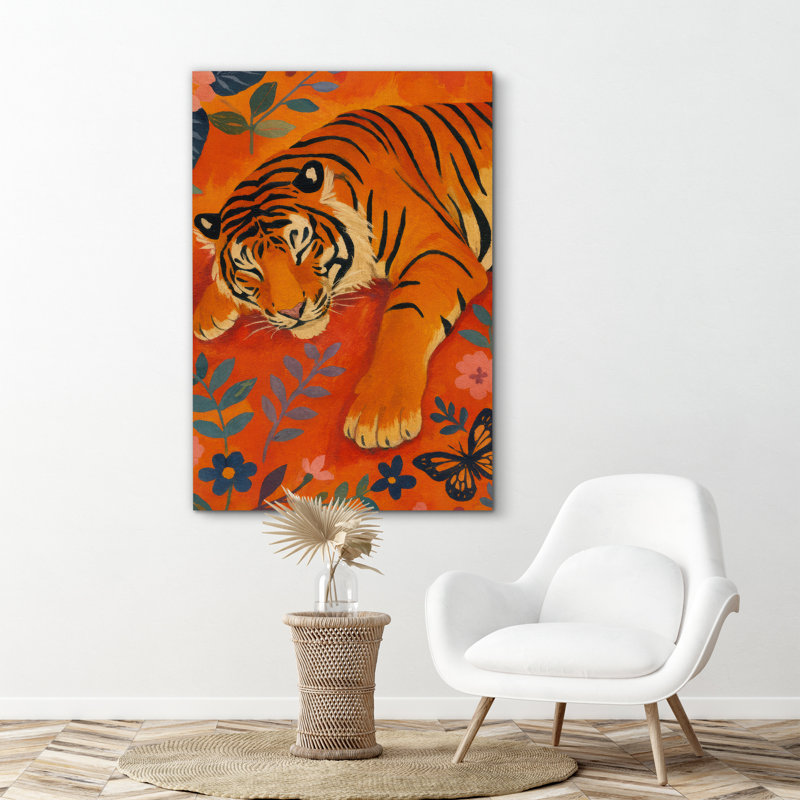 «Vibrant Tiger», reposant parmi des éléments floraux sur fond orange chaleureux - reproduction d'art sur toile encadrée