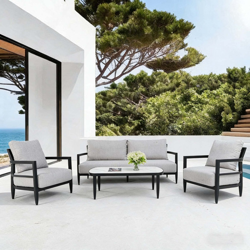 Ensemble de conversation 4PCS avec chaises club et table basse en pierre frittée