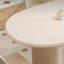 Table à manger ovale simple de style crème et chaise-105492959