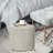 Round Tuffed Upholstered Storage Ottoman-1105199558